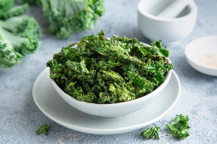 Kale chips in a white bowl
